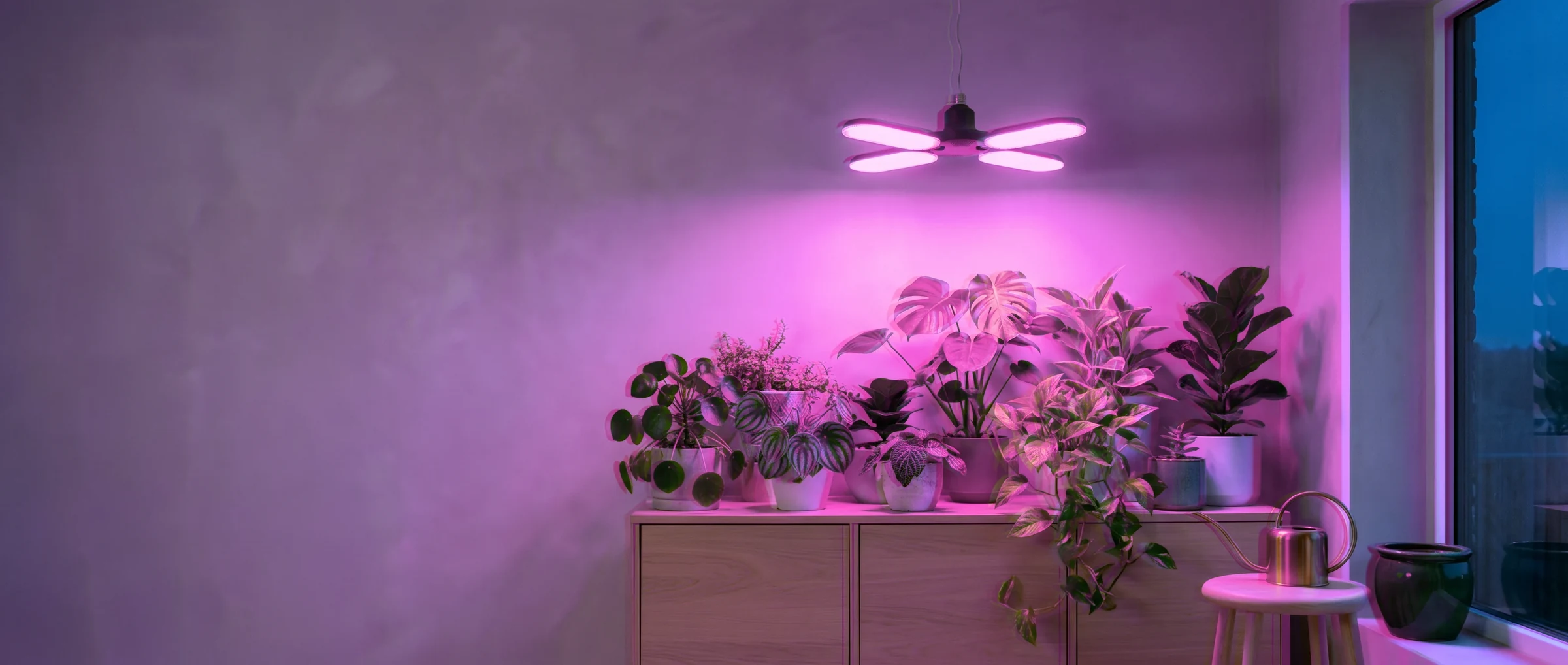 Foldable grow light switched on in a grow at dusk (illustration)