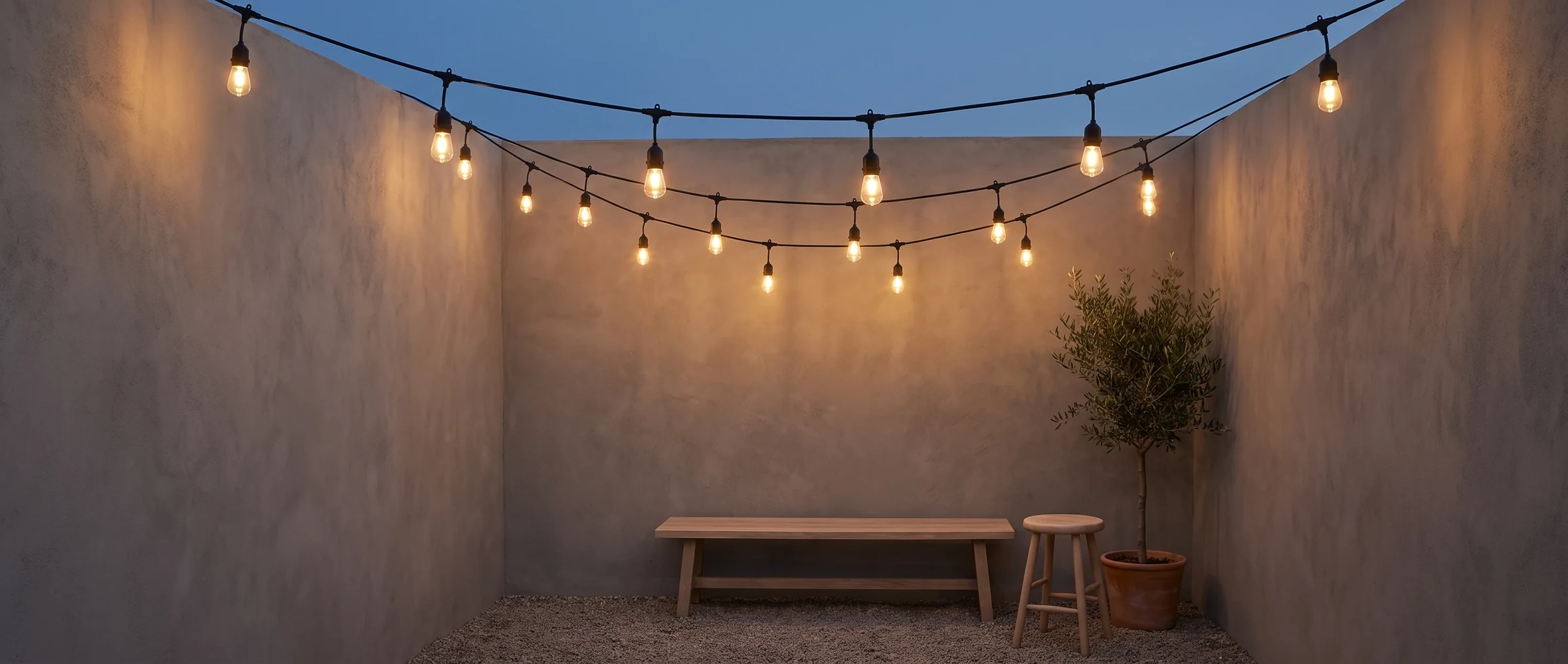 Café string light switched on in a patio at dusk (illustration)